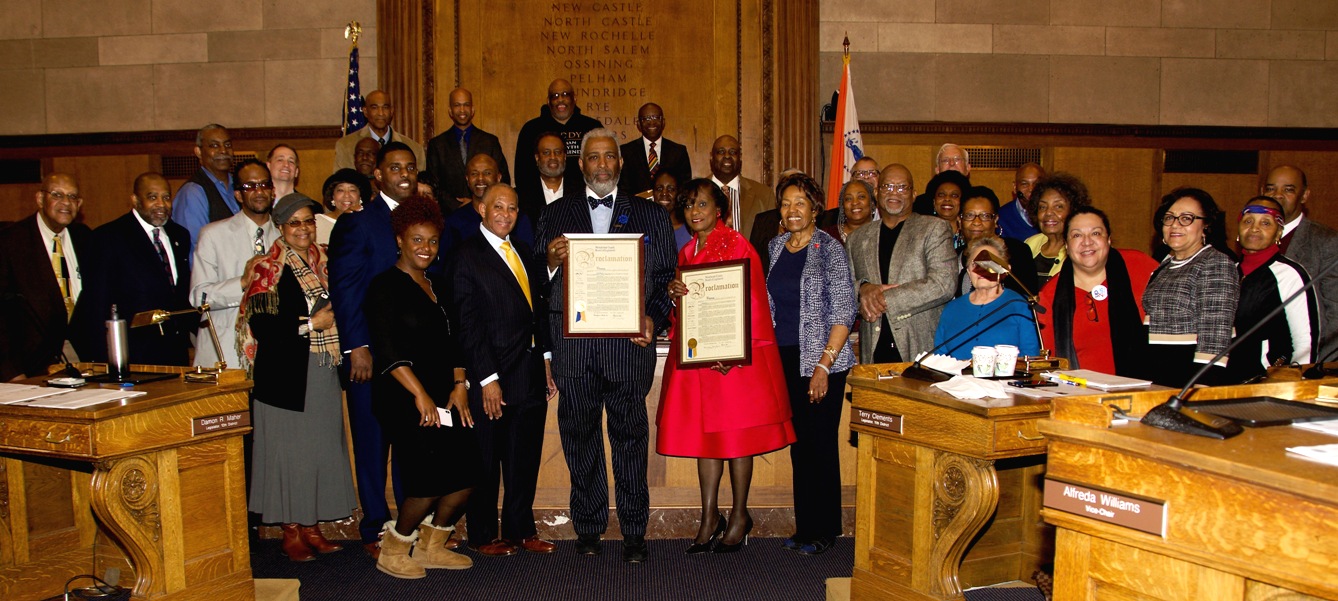 Honorees The Rev. Dr. Gregory Robeson Smith & Dr. Brenda L. Galloway Smith surrounded by Board Chair Ben Boykin, Vice Chair Alfreda William, other legislators, and friends and supporters)
