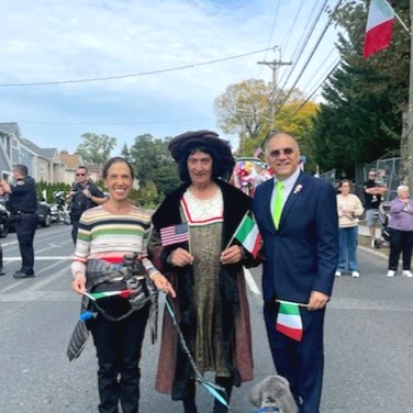 picture of Legislator Holstein and Eastchester Italian teacher, Lucrezia Lindia at the Columbus day parade
